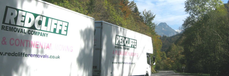 removal van and trailer en route through France